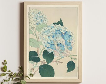 May include: A vintage Japanese woodblock print of a blue and white hydrangea flower with green leaves. The print is framed in a light wood frame.