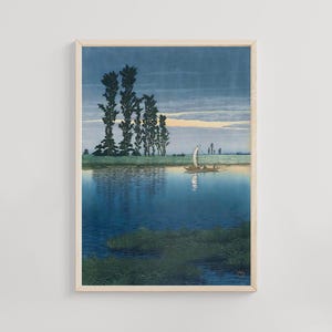 May include: A framed print of a serene landscape featuring a calm blue river reflecting the sky and trees. A small boat with a white sail floats on the water. The artwork has a traditional Japanese aesthetic.