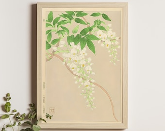 May include: A framed print of a Japanese botanical illustration featuring a delicate white wisteria flower with green leaves. The print has a light beige background and a red seal in the bottom right corner.