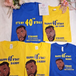 May include: Four yellow and blue t-shirts with a cartoon image of a man and the text "Happy 40th B'day Daddy" and "It's My 40th B'day" and "Happy 40th B'day My King". The text "DJ Macanakee... The Beat Dropper... Aged to Perfection!" is also on the shirts.