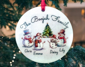 Personalised Christmas bauble,  sparkly snowman decoration, customised with family names to hang on the Christmas tree with ribbon.