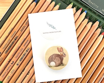 Rabbit button badge. A British wildlife original artwork printed onto a 3.8cm badge. Great badge collectors item or gift for a nature lover