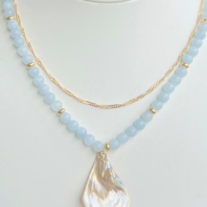 Necklace, Aquamarine gemstone necklace with shell accents, & 18k gold lariat closure, and free gold layering necklace chain! Shell necklace
