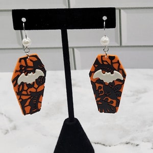 Orange Lace Coffin Earrings with White Bat