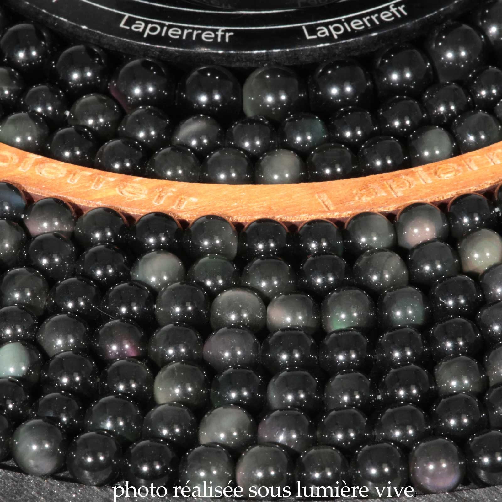 Perles d'Obsidienne Oeil Céleste rondes facettées percées - Minerals Store