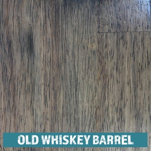May include: Close-up of a dark brown wood grain texture with the text "OLD WHISKEY BARREL" in white letters.