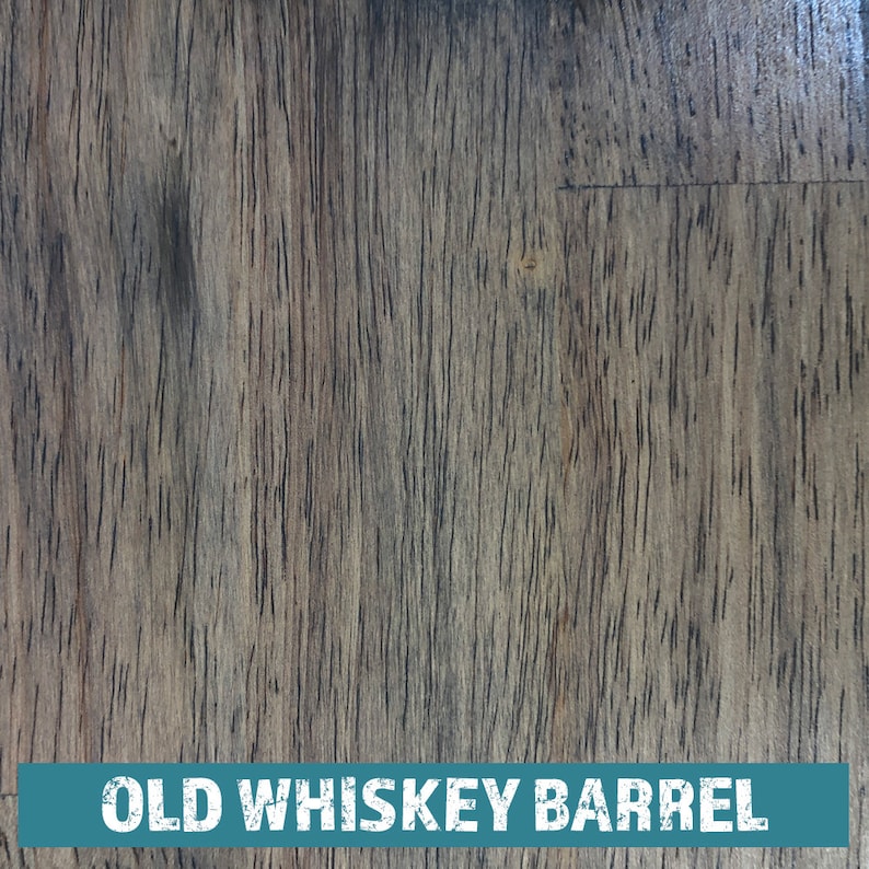 May include: Close-up of a dark brown wood grain texture with the text "OLD WHISKEY BARREL" in white letters.