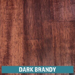 May include: Close-up of a dark brown wood grain surface. The wood has a rich, reddish-brown color with a slightly textured finish. The text "DARK BRANDY" is printed in white letters on a teal blue background at the bottom of the image.