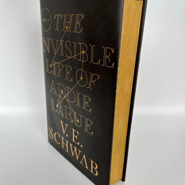 The Invisible Life of Addie LaRue with gold painted edges