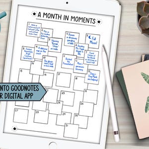 May include: A digital planner displayed on a white tablet, featuring a calendar layout titled "A Month in Moments." The planner includes numbered boxes for daily entries, with handwritten notes in blue ink. A stylus rests on the screen, and the text "Import into Goodnotes or other digital app" is visible.