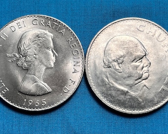 May include: Two silver coins, one featuring a profile of Queen Elizabeth II with the inscription "ELIZABETH II DEI GRATIA REGINA F.D." and the year "1965", the other featuring a profile of Winston Churchill with the inscription "CHURCHILL".