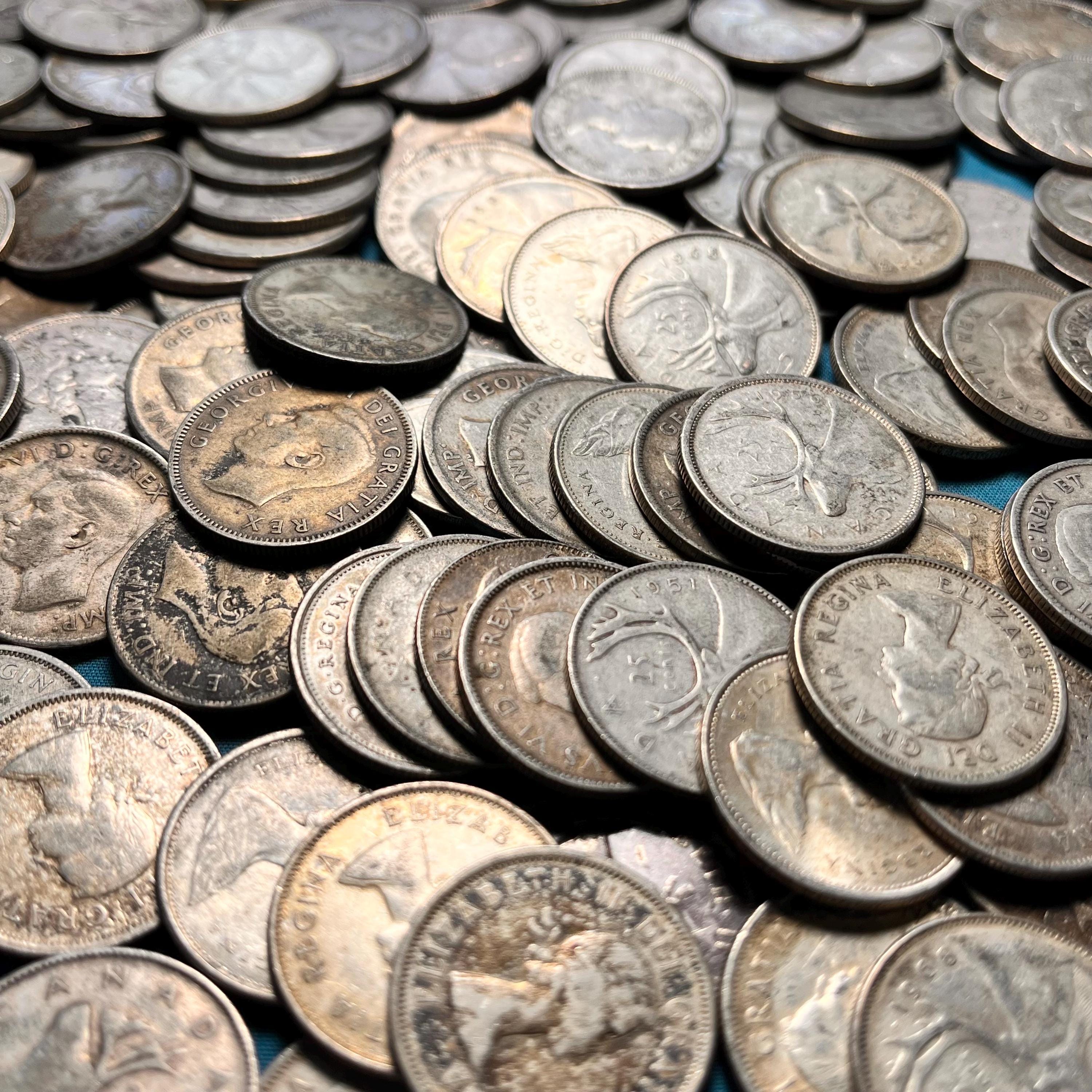 1968年以前の銀製カナダ鹿モチーフ25セント硬貨（流通グレード3種類