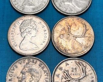 1968年以前の銀製カナダ鹿モチーフ25セント硬貨（流通グレード3種類