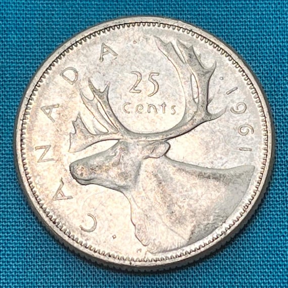 1968年以前の銀製カナダ鹿モチーフ25セント硬貨（流通グレード3種類
