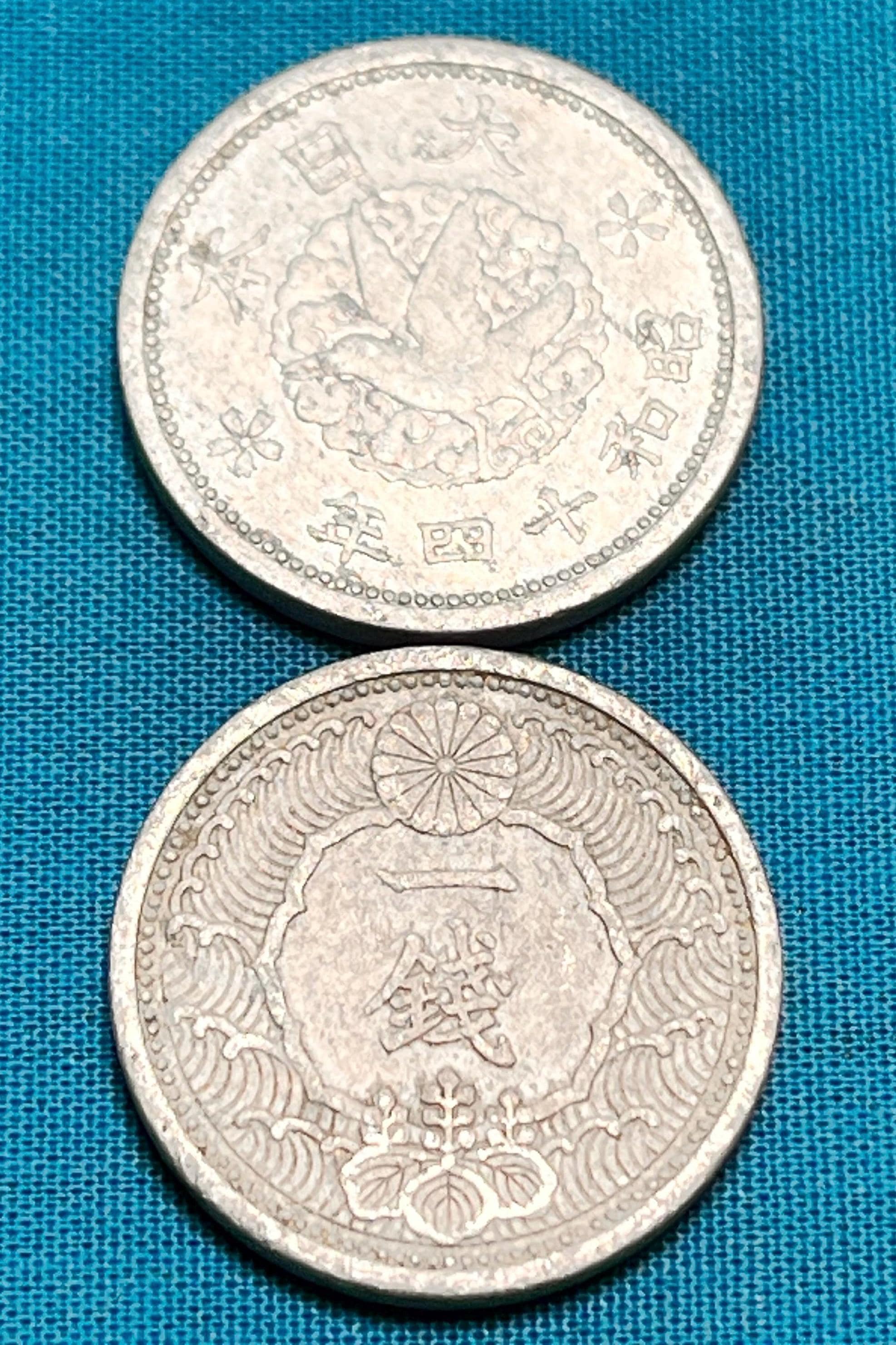 One JAPANESE WWII Era (1938-1940) Holed 1 Sen Coin Featuring