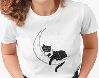 Cat reading on the moon women's t-shirt animal motif book graphic shirt woman cat lover graphic t-shirt