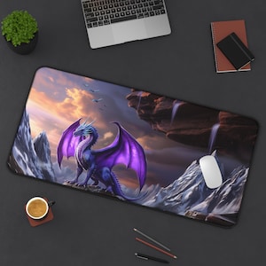 May include: A purple and blue dragon with wings spread wide, perched on a snowy mountaintop. The dragon is facing the viewer, with a sunset sky and waterfalls in the background.