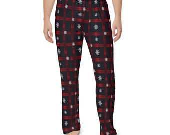 May include: Black pajama pants with a red and white plaid pattern and white snowflake designs.