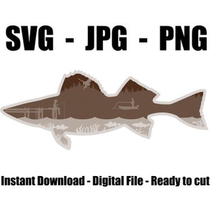 May include: A brown silhouette of a fish with a landscape scene inside. The fish is facing right and has a fin on its back. The landscape scene includes trees, a lake, and two people fishing. The text "SVG - JPG - PNG" is at the top of the image. The text "Instant Download - Digital File - Ready to cut" is at the bottom of the image.