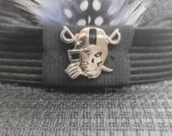 Raiders lapel pin