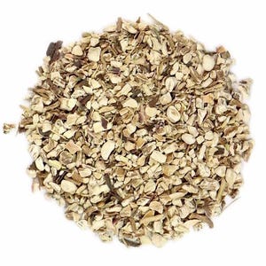 May include: A pile of dried, chopped dandelion root pieces. The organic material consists of small, irregular, beige and light brown fragments with a woody texture, arranged in a circular mound against a plain white background.