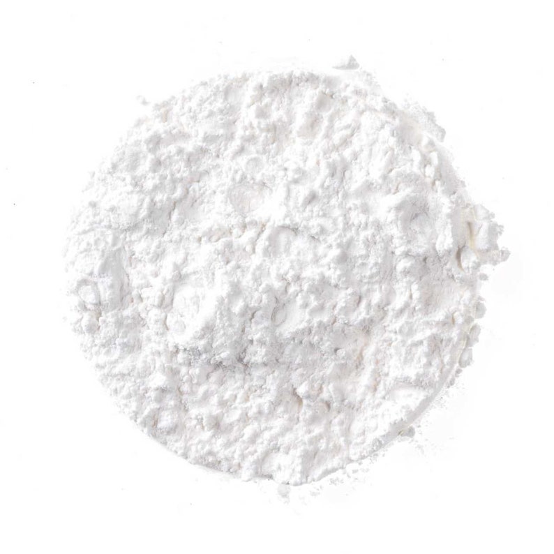 May include: A close-up of a pile of white flour, a common ingredient used in baking.