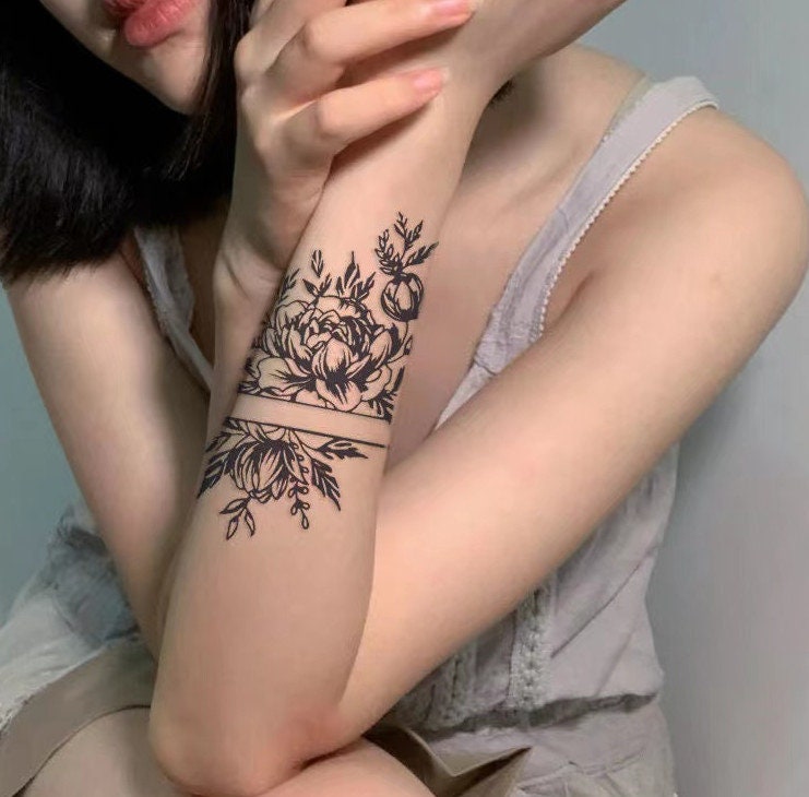 Beautiful flower armband tattoo  Tattoogridnet