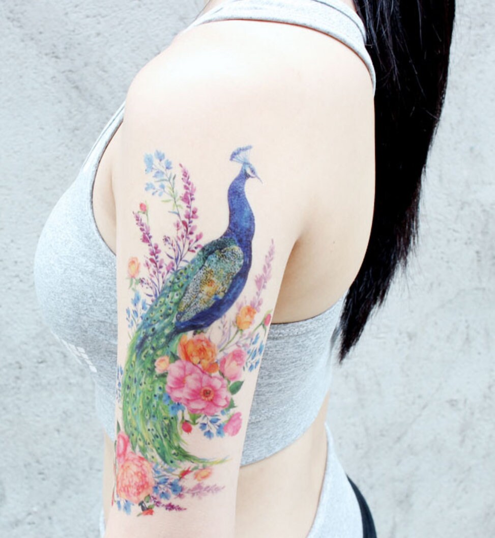 Peacock Tattoo Meaning  What Do Peacock Tattoos Symbolize