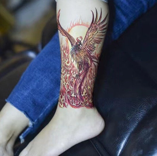Colorful Geometric Phoenix Tattoo On Girl Leg Calf