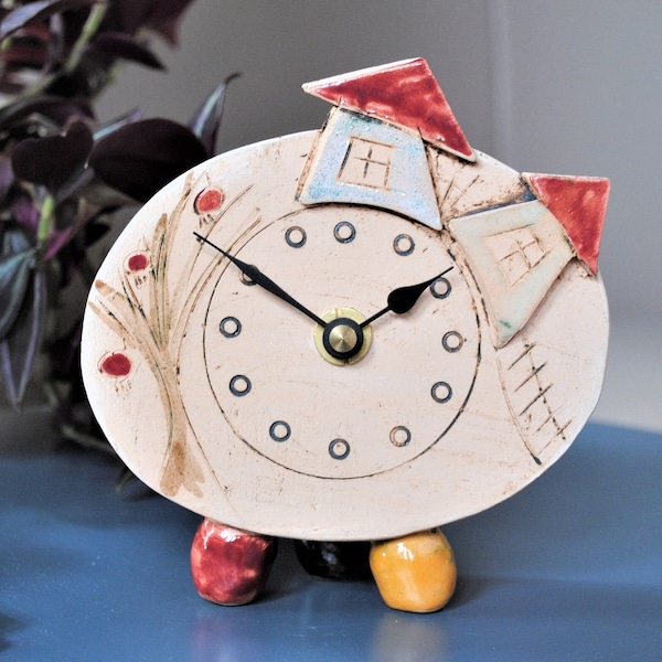 Small ceramic mantel clock decorated with house and tree. Unique gift for a new home, birthday or wedding. Quirky and unusual.