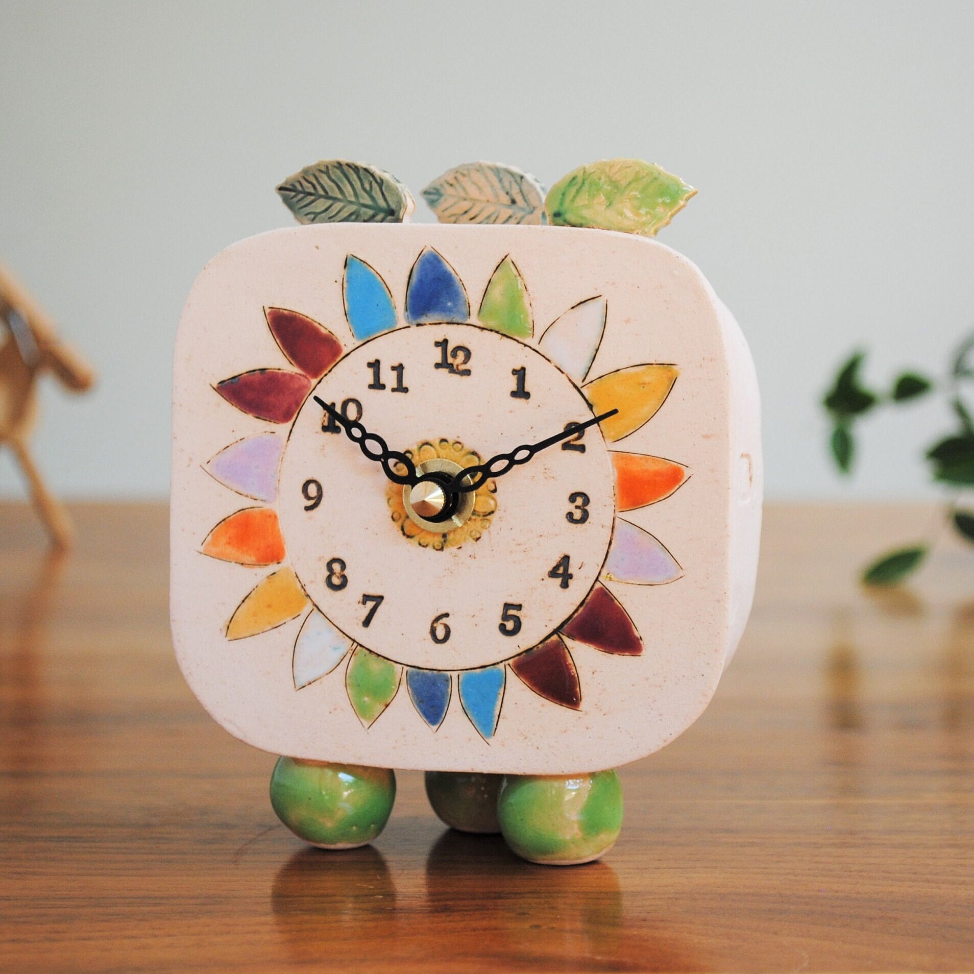 Small Handmade Analogue Clock With Daisy and Colorful Petals. Unusual