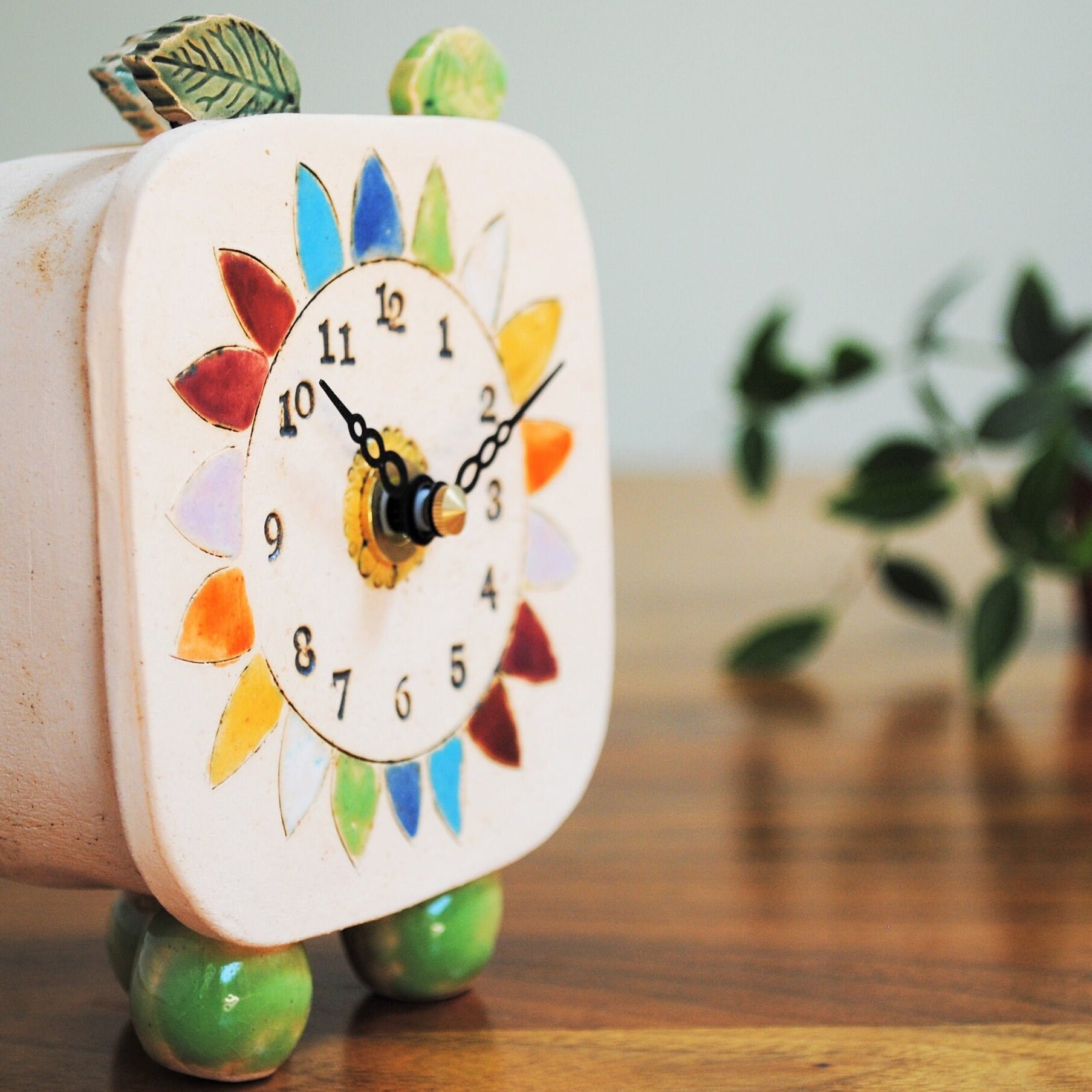 Small Handmade Analogue Clock With Daisy and Colorful Petals. Unusual