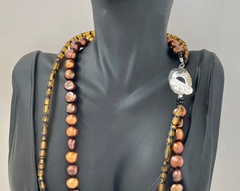 Statement Necklace with Fresh Water Pearls, African Brass and a Silver toggle.