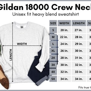 May include: A gray crew neck sweatshirt with size chart showing width, length, and sleeve measurements in inches for sizes S through 5X. The text "Gildan 18000 Crew Neck" and "Unisex fit heavy blend sweatshirt" are at the top of the image. The text "Fits true to size." is at the bottom of the image.