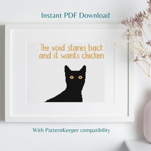 May include: Black and white cross stitch pattern featuring a black cat with the text "The void stares back and it wants chicken".
