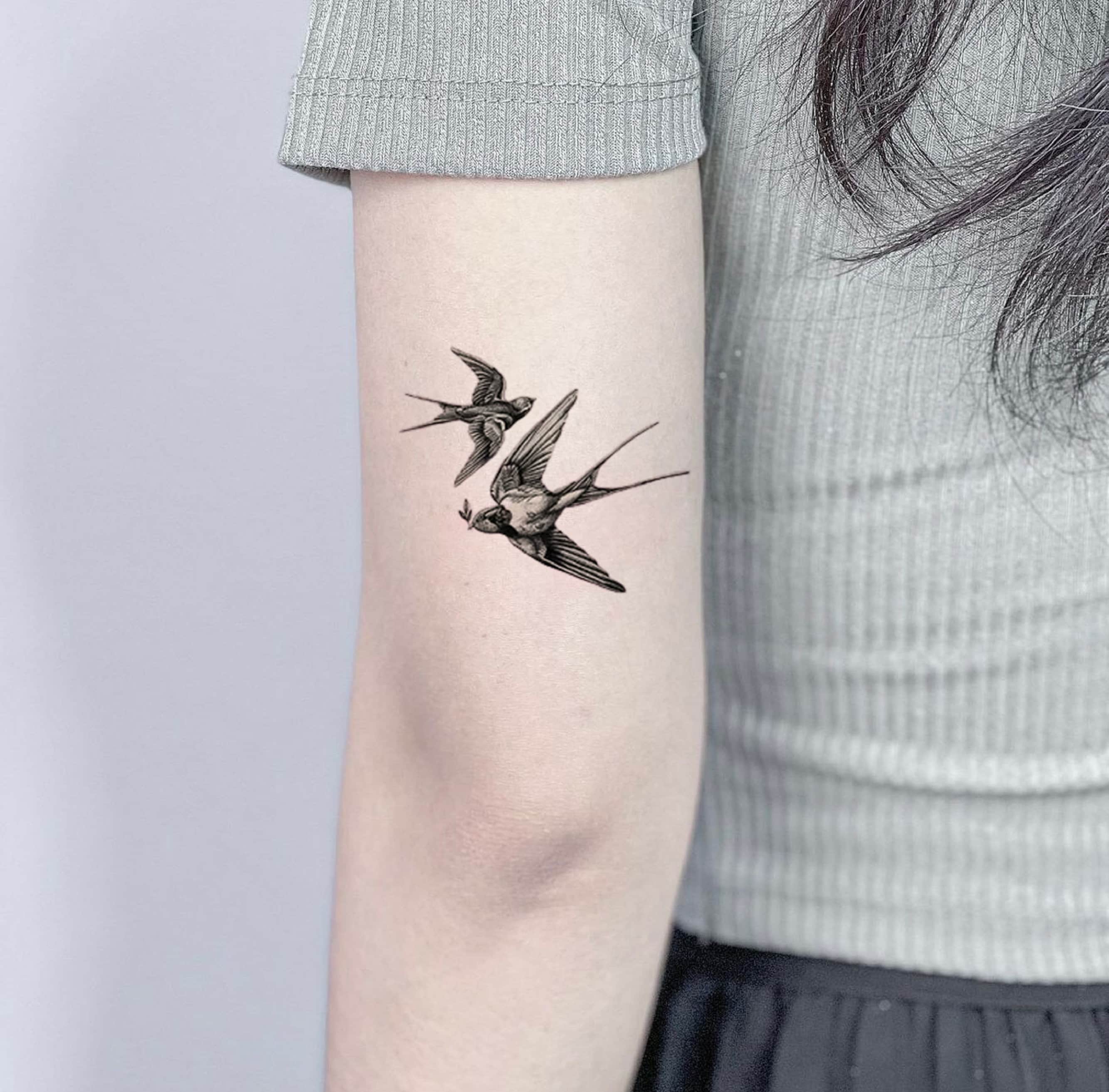 Black Sparrow Wrist Tattoos