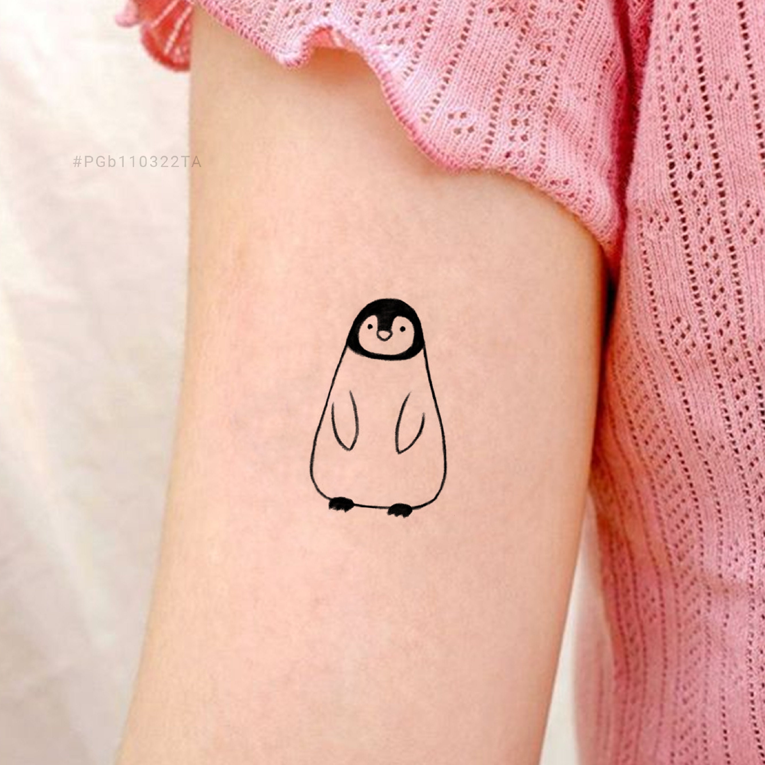 Fun enhancement of friadoos old penguin tattoo  We fixed up some  fadedcracked parts added colorful elements and applied a bit of a   Instagram