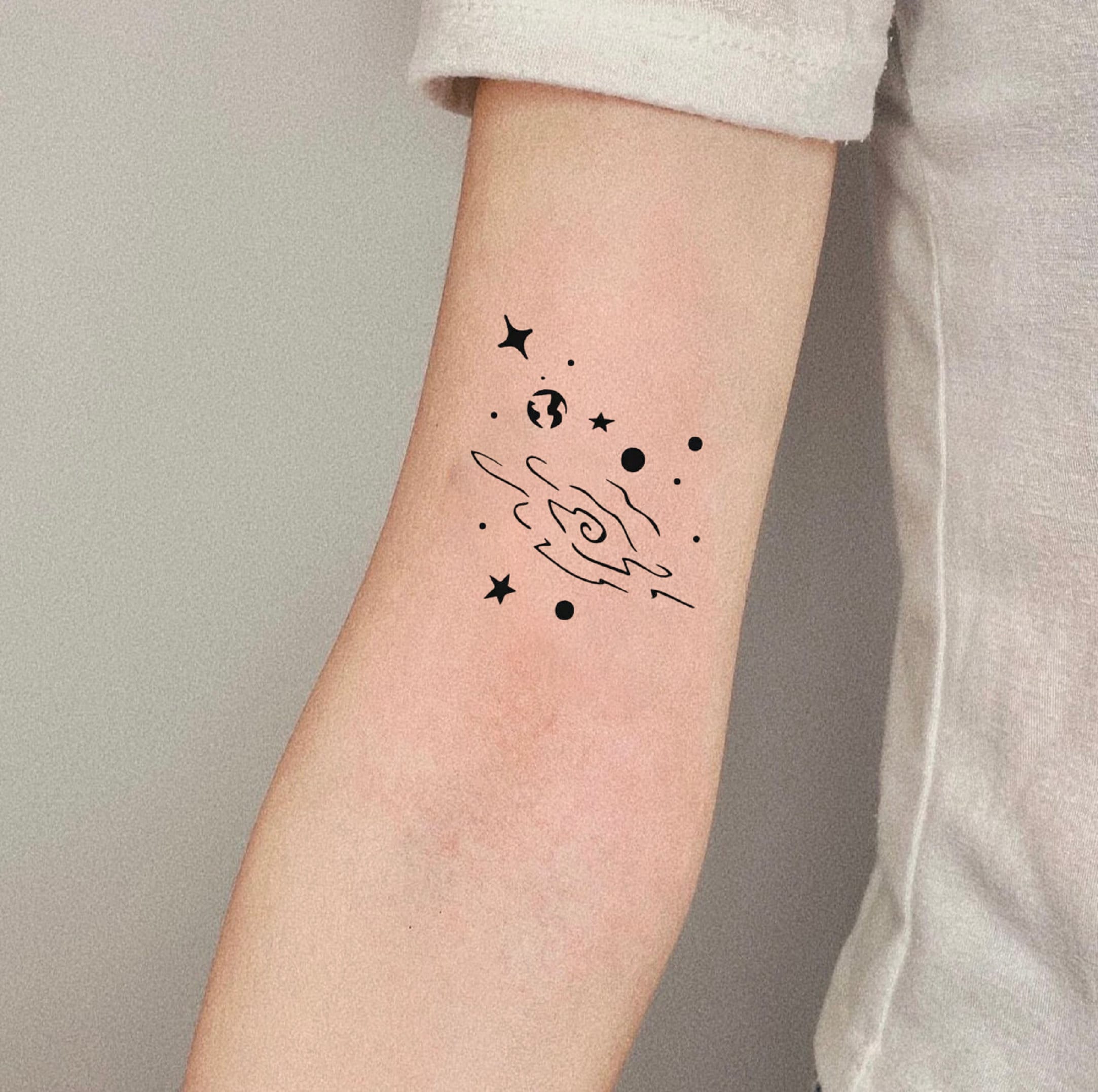 30 Mesmerizing Galaxy Tattoo Ideas for Men  Women in 2023