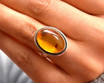 Natural Glossy Cognac color Genuine Baltic Amber ring 6.3 grams.