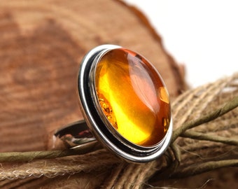 Natural Glossy Cognac color Genuine Baltic Amber ring 6.3 grams.