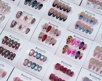Caja de uñas ocultas, dos o tres juegos de uñas postizas, caja sorpresa, gel 3D/francés/ojo de gato, juegos de uñas al azar, regalos para mujeres, uñas reutilizables
