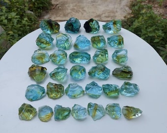 32 pcs//1084 gr (12-63 gr) of rough Andara Crystal Aqua Blue with Hair Yellow Fiber Inside Monatomic