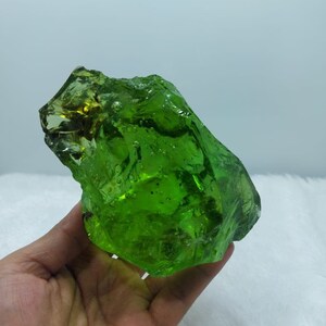 1094 grams of rough Andara crystal light green with bubble inside.