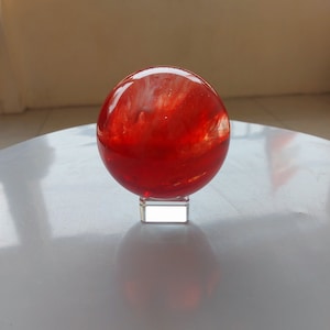 697 gr (diameter 84 mm) of Beautiful Polished Andara Crystal Ball Rare