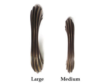 2 34 inch centres ribbed bin pulls shell handles P1832 Weathered shell pulls