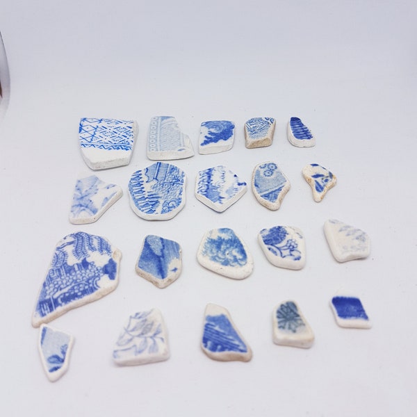 Sea pottery in various shapes and sizes. Beautiful blue and white set of 20 pieces for your crafting or jewellery making.