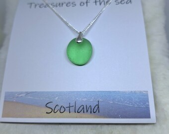 Scottish sea glass pendant in bright green. Sterling silver bale and 18 inch chain. Ideal birthday or easter gift.