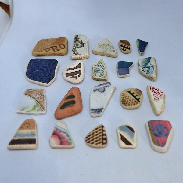 Sea pottery in various shapes, colours and sizes. Beautiful set of 20 pieces for your crafting or jewellery making.