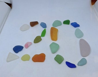 Scottish sea glass in beautiful colours, lovely collection of  20 pieces in various colours and sizes.  For Crafting or jewellery making.