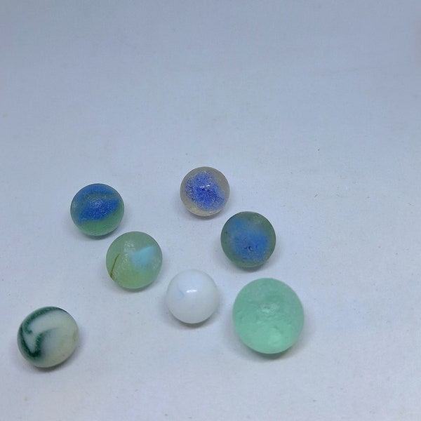 Scottish sea glass marbles in various colours and sizes (7 in total). Discovered on Scottish beaches, ideal for jewellery making and crafts.